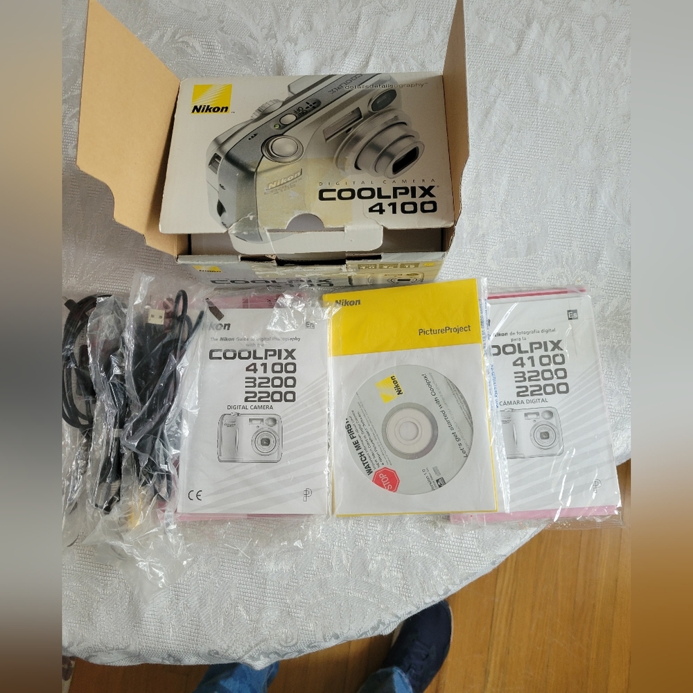 Coolpix 4100   All The Setup And Manuals, Cords. Etc..NO CAMERA
